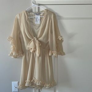 Super cute cream romper